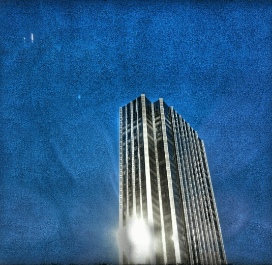 Skyscraper NYC soaring blue sky